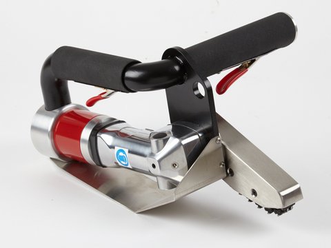 Hand held diecut stripping machine